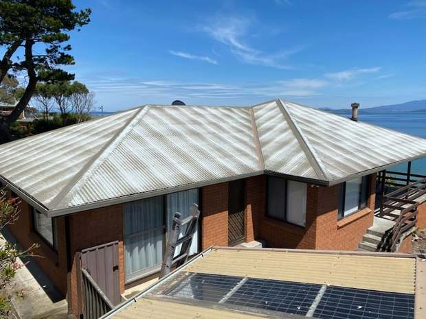 Coastal metal roof, salt-oxidised before